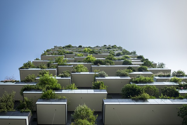 sustainable architecture example showing building with living plants on large terraces
